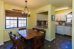 Open eat-in Kitchen with breakfast bar at 101 Quail Run off Moon Branch, Dadeville, AL_Lake Martin ALWaterfront homes for sale. Professional photos and tour by Go2REasssistant.com