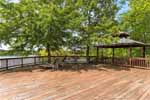 Extensive deck perfect for entertaining at 1043 Smith Mountain Drive, Lake Martin - Jacksons Gap,  AL. Professional photos and tour by Go2REasssistant.com