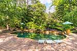 Your private oasis with salt water pool and waterfall at 1201 Kirkwood in Eastwood Farms, Montgomery, AL. Professional photos and tour by Go2REasssistant.com