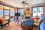 Screened porch with fireplace at 1227 Pine Road, New Site, AL. I Shoot Houses...Professional photos and tour by Sherry Watkins at Go2REasssistant.com