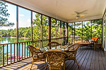 Main level screened porch at 128 Stonehouse Road in The Preserve at Stoney Ridge, Dadeville, AL. Professional photos and tour by I Shoot Houses at Go2REasssistant.com