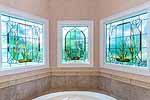 3 stunning stained glass windows n Master Bath at 136 Oaks Point in River Oaks, Lake Martin - Jacksons Gap,  AL. I Shoot Houses... photos and tour by Go2REasssistant.com