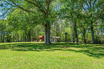 Shady play area at 1415 Milly Branch, Pike Road, AL. I Shoot Houses...photos and tour by Sherry Watkins at Go2REasssistant.com
