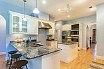 Bright, open kitchen at 4413 Bell Road, Montgomery, AL. Professional photos and tour by Go2REasssistant.com