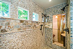 Spectacular walk-in shower at 151 N. Darby on Lake Martin, Eclectic, AL. Professional photos and tour by Go2REasssistant.com