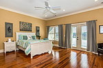 Spacious master suite with private balcony at 1529E Point Windy, Lake Martin - Jacksons Gap,  AL. I Shoot Houses...Professional photos and tour by Sherry Watkins at Go2REasssistant.com