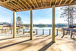 Terrace level covered patio at 1529E Point Windy, Lake Martin - Jacksons Gap,  AL. I Shoot Houses...Professional photos and tour by Sherry Watkins at Go2REasssistant.com