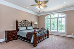 Main level Master Suite at 156 Walnut Point Drive in Emerald Mountain, Wetumpka, AL. Professional photos and tour by Go2REasssistant.com