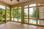 Screened porch overlooking pool and mountain view at 156 Walnut Point Drive in Emerald Mountain, Wetumpka, AL. Professional photos and tour by Go2REasssistant.com