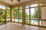 Screened porch overlooking pool and mountain view at 156 Walnut Point Drive in Emerald Mountain, Wetumpka, AL. Professional photos and tour by Go2REasssistant.com