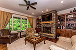 Living Room with stone fireplace at 1698 Capstone Drive, Alexander City,  AL. I Shoot Houses... photos & tour by Go2REasssistant.com