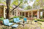 Rear porch and brick patio at 1845 South Hull Street in historic Cloverdale, Montgomery, AL. Professional photos and tour by Go2REasssistant.com