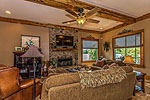 Greatroom with stone woodburning fireplace at 188 Rush Road, Lake Martin - Dadevile,  AL. I Shoot Houses... photos and tour by Go2REasssistant.com