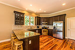 Bright, open kitchen at 1923 Point Windy, Lake Martin - Jacksons Gap,  AL. Professional photos and tour by Go2REasssistant.com
