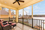 Main level screened porch at 192 Village Loop in The Village, Dadeville, AL_Lake Martin ALWaterfront homes for sale. Professional photos and tour by Go2REasssistant.com