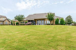 Rear view at 1931 Lake Beauvoir Drive in Beauvoir, Montgomery, AL. Professional photos and tour by Go2REasssistant.com