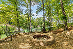 Fire pit stone patio at 195 Fairwinds North in Windermere,Alexander City AL. I Shoot Houses...Professional photos and tour by Go2REasssistant.com