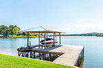 Boathouse with power lift at 199 Rush Road, Lake Martin - Dadeville,  AL. I Shoot houses...Professional photos and tour by Go2REasssistant.com
