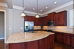 Kitchen with breakfast island at 1 Tanglewood Circle, Dadeville, AL_Lake Martin ALWaterfront homes for sale. Professional photos and tour by Go2REasssistant.com