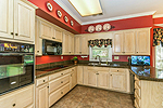 New granite counters in kitchen at 2255 Vaughn Lane in Vaughn Meadows, Montgomery, AL. Professional photos and tour by Go2REasssistant.com