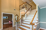 Grand staircase in foyer at 2255 Vaughn Lane in Vaughn Meadows, Montgomery, AL. Professional photos and tour by Go2REasssistant.com