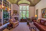 Cozy library den with wood ceiling and fireplace at 2337 Wildwood in McGehee Estates, Montgomery, AL. Professional photos and tour by Go2REasssistant.com