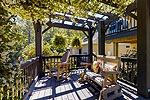 Lower deck with Jasmine covered arbor at 249 Cottage Court in The Cottages at Marina Marin Estates, Dadeville, AL_Lake Martin ALWaterfront homes for sale. I Shoot Houses...Professional photos and tour by Sherry Watkins at Go2REasssistant.com