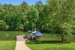 Level grassy area lakeside at 249 Cottage Court in The Cottages at Marina Marin Estates, Dadeville, AL_Lake Martin ALWaterfront homes for sale. I Shoot Houses...Professional photos and tour by Sherry Watkins at Go2REasssistant.com