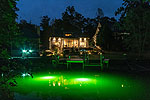 Evening lights lakeside at 261 Cottage Court in The Cottages at Marina Marin Estates, Dadeville, AL_Lake Martin ALWaterfront homes for sale. Professional photos and tour by Go2REasssistant.com