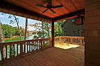 Covered balcony view at NorEaster Ridge Run, The Ridge, Alexander City, AL on beautiful Lake Martin. Professional photos and tour by Go2REasssistant.com