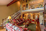 Open loft living area above Greatroom at 297 Wood Sorrell Way in River Oaks, Jacksons Gap, AL. Professional photos and tour by Go2REasssistant.com