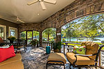Screened porch with stone arches at 30 Elysain Way, Equality, Lake Martin - Alexander City,  AL. I Shoot Houses... photos & tour by Go2REasssistant.com