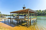 Boat house with 2 power lifts at 30 Elysain Way, Equality, Lake Martin - Alexander City,  AL. I Shoot Houses... photos & tour by Go2REasssistant.com