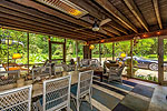 Inviting oversized screened porch at 3225 East Audobon in historic Cloverdale, Montgomery, AL. Professional photos and tour by Go2REasssistant.com