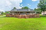 Deep lakeside porch at 34 Centerport Road, Lake Martin - Dadeville,  AL. I Shoot Houses... photos and tour by Go2REasssistant.com