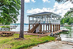 Boat ramp and 2-story boathouse with 2 boatlifts at 34 Centerport Road, Lake Martin - Dadeville,  AL. I Shoot Houses... photos and tour by Go2REasssistant.com
