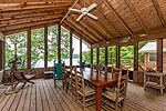 Huge screened porch at 469 Hook Road on Kowliga Creek, Equality, AL_Lake Martin AL Waterfront homes for sale. Professional photos and tour by Go2REasssistant.com