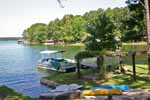 Summertime by pier and boat ramp at 80 Crows Nest in Paces Point, Dadeville, AL_Lake Martin ALWaterfront homes for sale. Professional photos and tour by Go2REasssistant.com