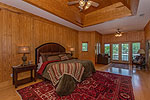 Master suite opens to deck and private screen porch at 48 Sweet Bay in Trillium, Lake Martin - Jacksons Gap,  AL. Professional photos and tour by Go2REasssistant.com