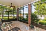 Terrace level screened porch at 493 Windy Wood, Windermere West, Lake Martin, Alexander City, AL. Professional photography and tour by Sherry Watkins, Go2REassistant.com