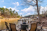 Enjoy lake side firepit and beautiful sunsets at 499 Old Still Rd in the Preserve at Stoney Ridge, Lake Martin - Dadeville,  AL. Professional photos and tour by Go2REasssistant.com
