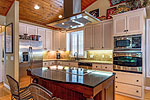 Kitchen designed for entertaining at 54 Raegan Point in Longleaf, Dadeville, AL_Lake Martin ALWaterfront homes for sale. Professional photos and tour by Go2REasssistant.com