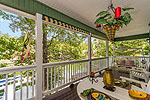 Wrap-around cover porch extends living areas outside at 54 Raegan Point in Longleaf, Dadeville, AL_Lake Martin ALWaterfront homes for sale. Professional photos and tour by Go2REasssistant.com