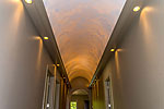 Handpainted barrel ceiling in hall to bedrooms at 55 Stone Ridge, The Ridge on Lake Martin, Alexander City, AL 