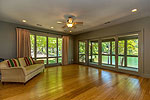 Den opens to screened porch at 55 Stone Ridge, The Ridge on Lake Martin, Alexander City, AL 