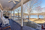Deep covered porch overlooking lake at 56 Wind Hollow in Windermere West, AL. Professional photos and tour by Go2REasssistant.com