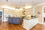 This kitchen was designed for entertaining at 636 Latigo Road, Waterfront Country Estate,  Ramer, AL. Professional photos and tour by Go2REasssistant.com