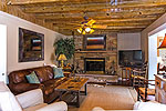 Wood ceiling and stone fireplace at 65 Jasmine Lane, Tallassee, Lake Martin - Alexander City,  AL. I Shoot Houses... photos & tour by Go2REasssistant.com