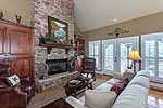 Grand Greatroom with stone fireplace at 684 Long Pine in Trillium, Lake Martin - Jacksons Gap,  AL. Professional photos and tour by Go2REasssistant.com