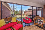 Deep screened porch at 7097 Old Southwick in Wynlakes, Montgomery, AL. Professional photos and tour by Go2REasssistant.com